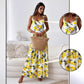 Elegante vestido largo de tirantes con estampado de limones