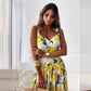 Elegante vestido largo de tirantes con estampado de limones