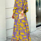 Conjunto de vestido largo con mangas con aberturas en espiral gothems1